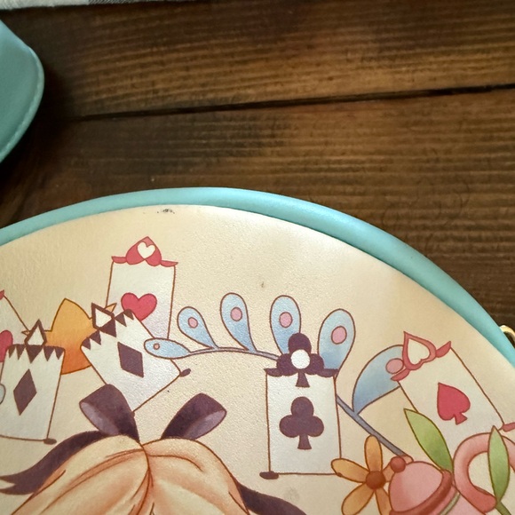 Alice-Themed Round loungefly Crossbody Bag in Light Blue - Picture 2 of 3